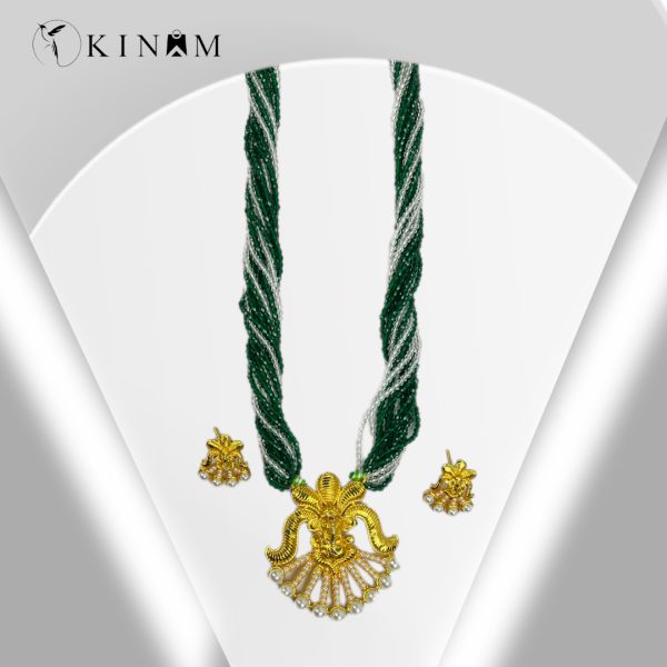 raditional green and white pote necklace with gold plated pendant